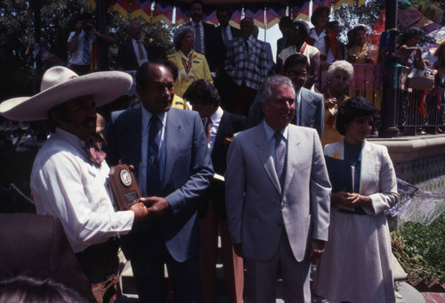 Mayor Bradley presents plaque