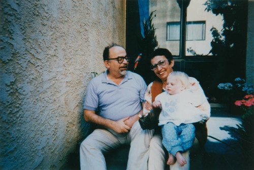 Gurbuz couple with granddaughter