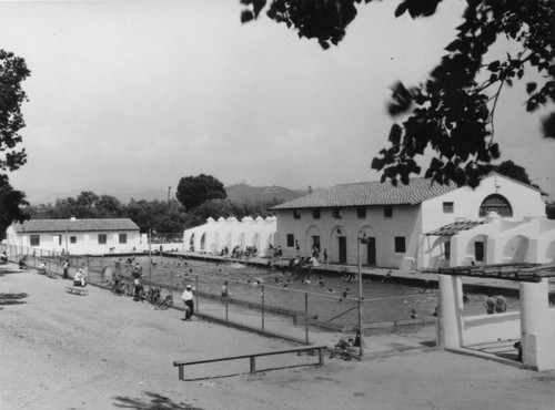 Looking through the fence at the swimming pool