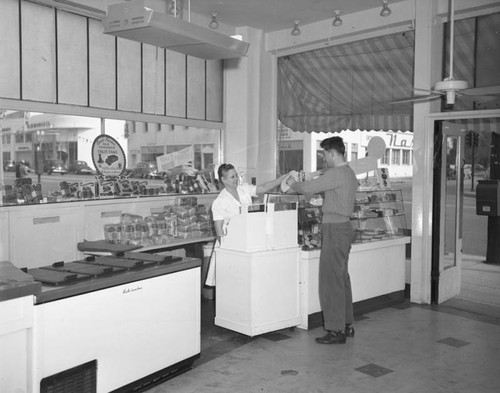 Customer being served at a Currie's Ice Cream store