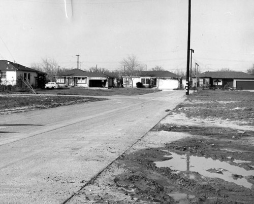 Junk-littered lot before, after Valley Times' story