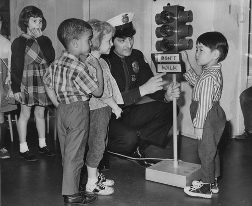 Police officer teaches traffic safety