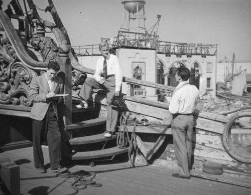 Meeting on board a movie set pirate ship