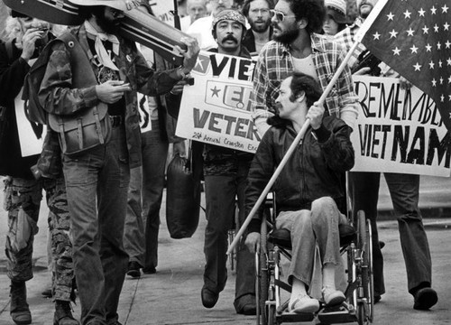 Ron Kovic leads march