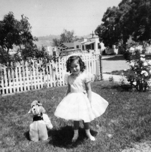 Girl and her toy dog