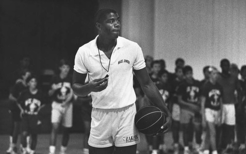 Magic overseeing his basketball camp