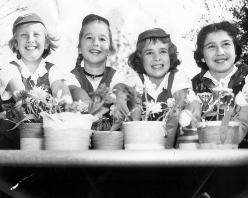 Blue Birds distribute May baskets