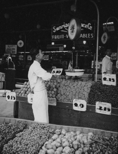 Shopping at Hollywood Market's fruit stand