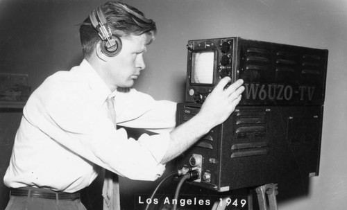 Technician with TV equipment