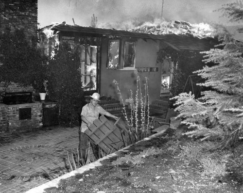 Patio chair saved near gutted house