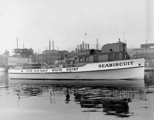 Capt. Bauer and Seabiscuit fishing boat