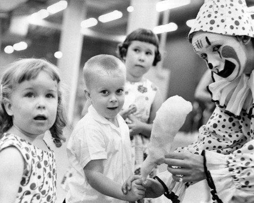 Youngsters and 'clown for a day' exchange greetings at circus