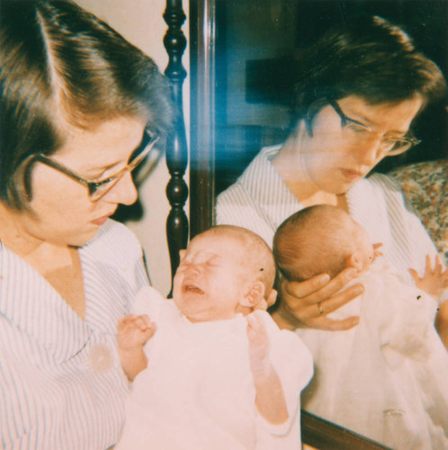 Woman holding infant