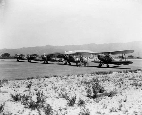 Five planes parked, Burbank Airport