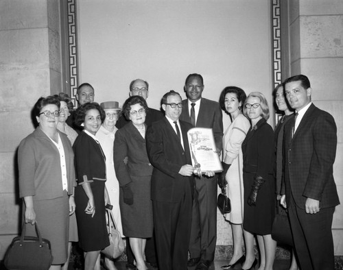 Councilman Tom Bradley presents resolution to Rabbi Paul Dubin