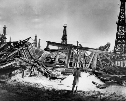 Oil well derrick blown down by winds