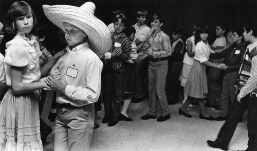 Children at a cotillion dance