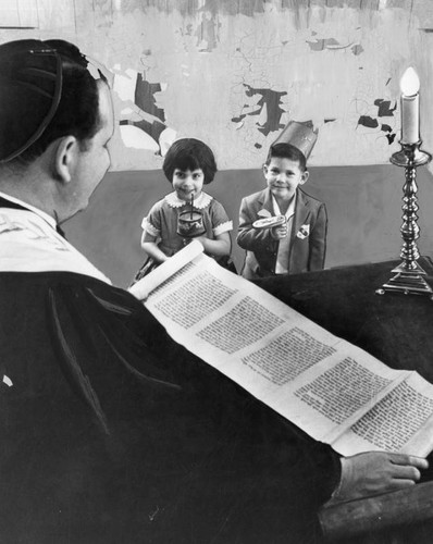 Rabbi Ben Zion Bergman, Temple Beth Shalom, reads Megillah