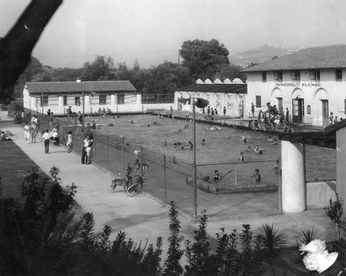 Looking through the fence at the swimming pool