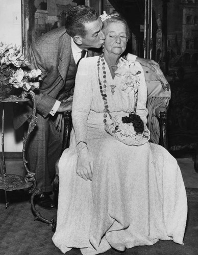 Isabella Horton receives kiss from son Edward Everett Horton