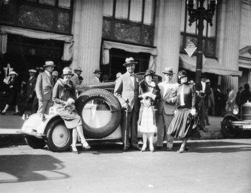 Bankers and family as tourists