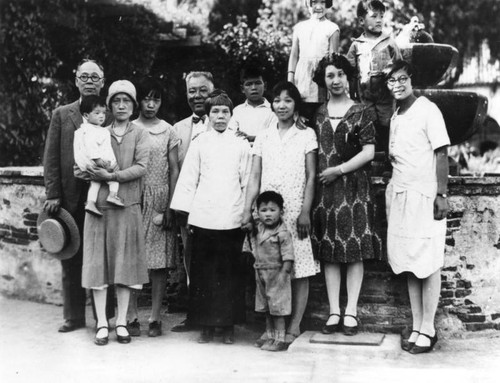 Chinese American family in front of fountain