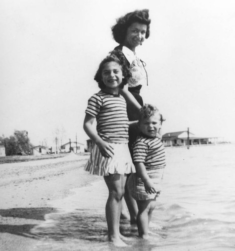 Mother and children at beach