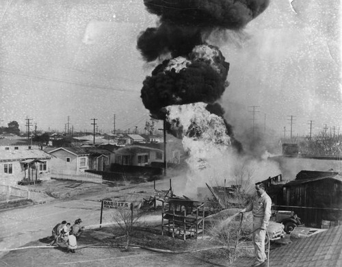 Atom-Llke ball of fire rises skyward in Lawndale gasoline pipe blast