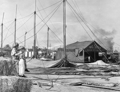 Children watching circus tent