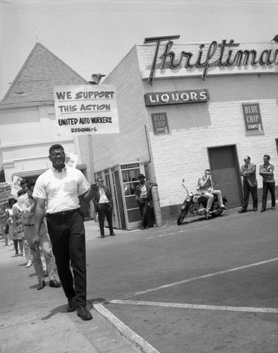 Demonstrators outside the Thriftimart