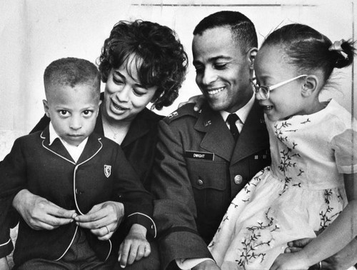 New astronaut poses with wife and children