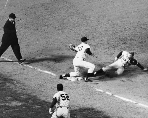 Dodgers Daryl Spencer puts tag on Richie Ashburn in third base action