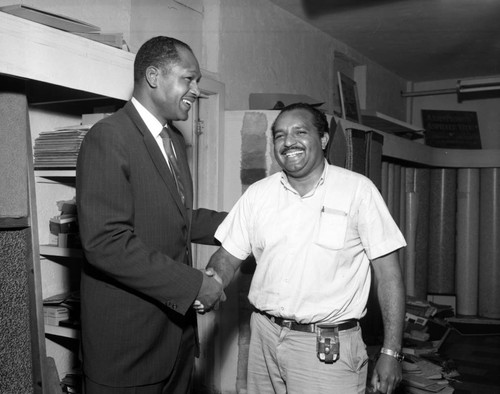 Tom Bradley campaigning, 1965 — Calisphere