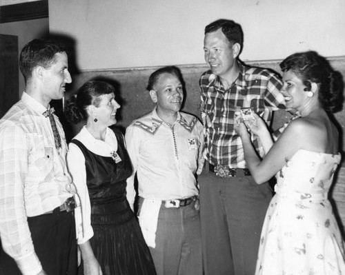 Square dancers pin officers