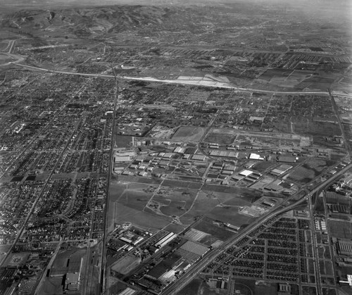 Aerial view of Vail Field and Central Manufacturing District, looking east