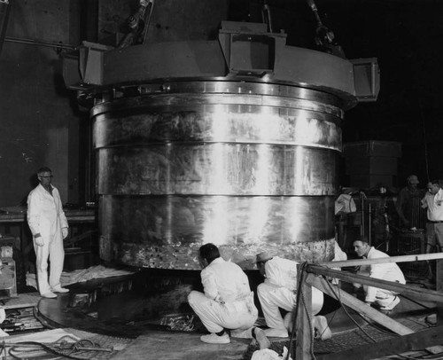 Installation of 75-ton shield, shield being lowered, for Sodium Reactor Experiment reactor