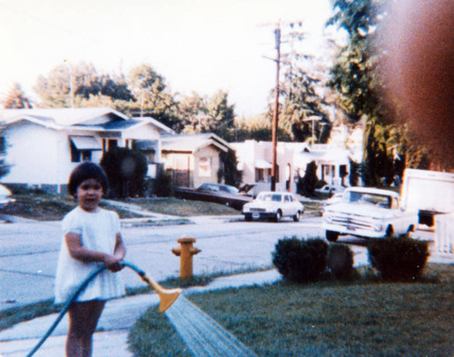Girl in front yard