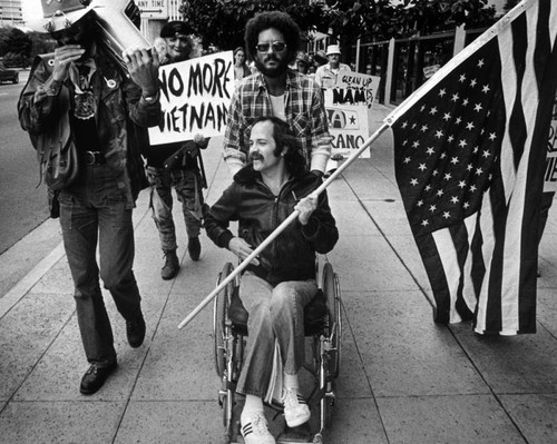 Ron Kovic leads march