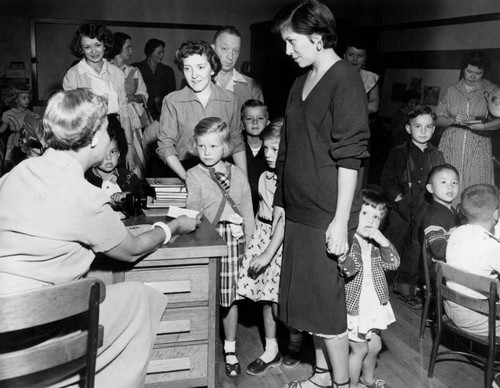 Parents bring children to class