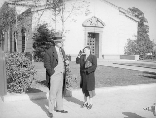 Couple in front of a building in Santa Monica