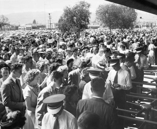 Men collecting tickets