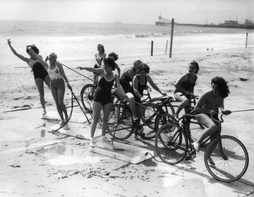 "52 Club" members riding on blocks of ice, view 7