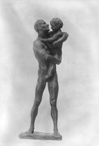 Man and child sculpture