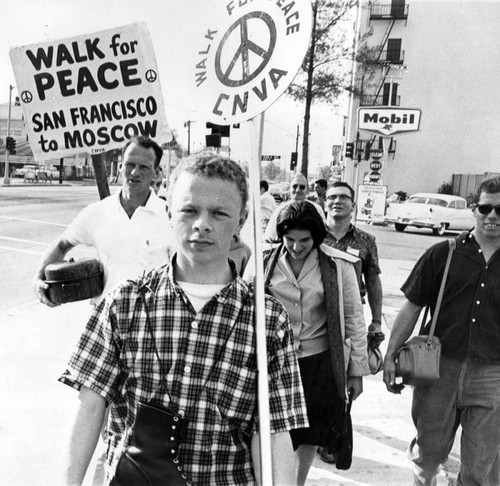 Foot-sore peace hikers march through Valley