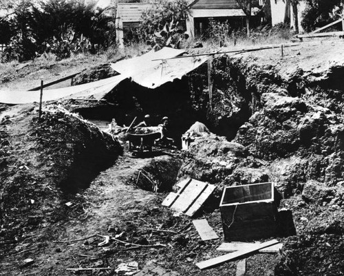 Men in excavation pit