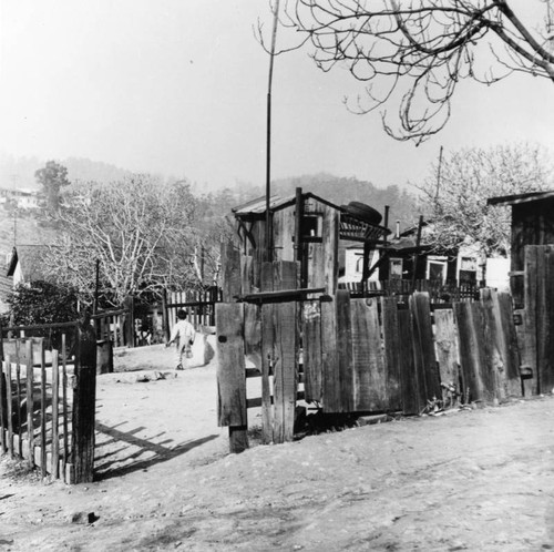 Exterior view of unpainted, run down buildings