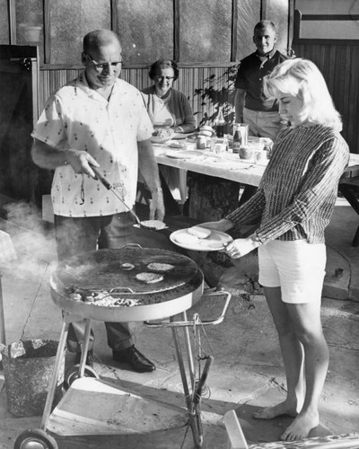 The Lloyd Kohl family enjoys outdoor cooking