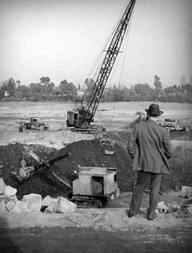 Digging a trench in the Los Angeles River