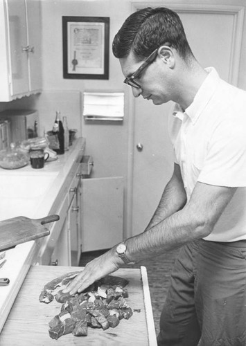 Eric Steiner preparing gourmet dinner