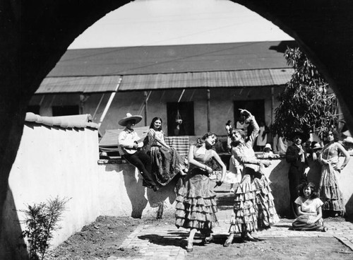 Dancers in front of Avila Adobe